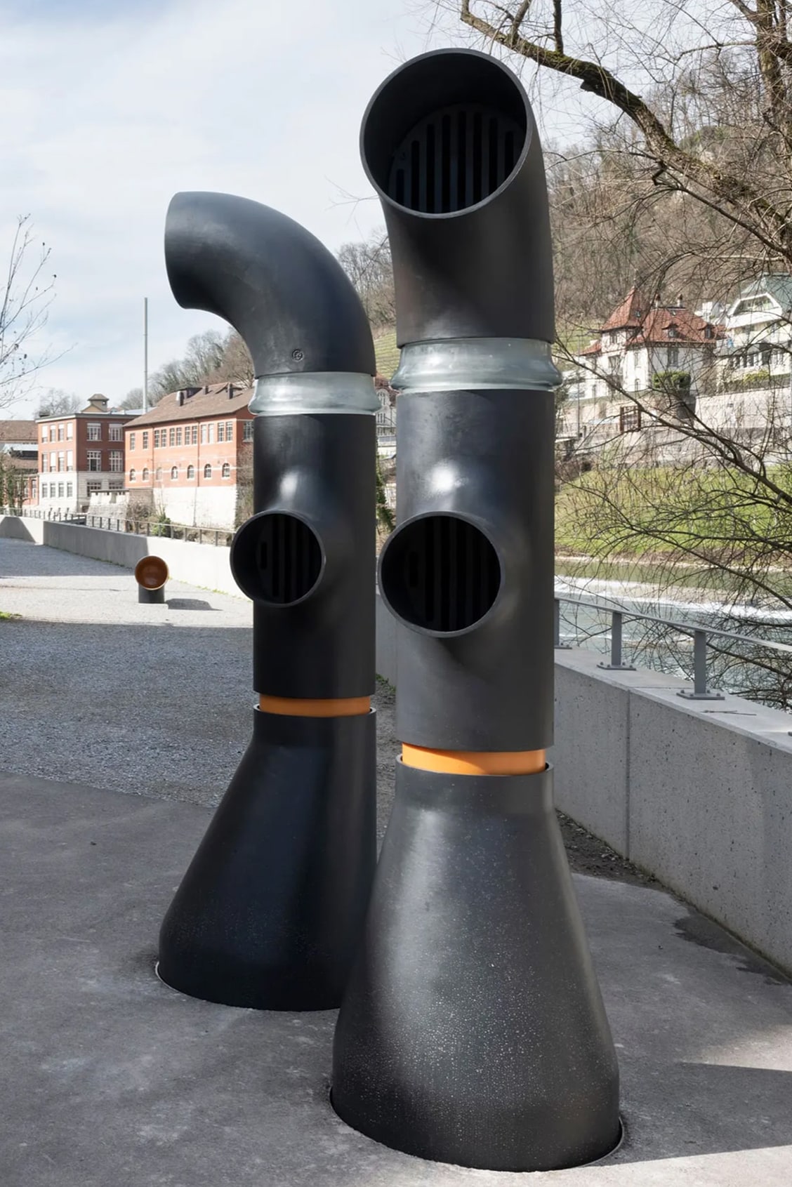 Architecture thermal bath hot spring spa 47 Baden Thermal spring art foundry Christenguss outdoor installation Limmat riverside promenade river waterfront Mario Botta Competition